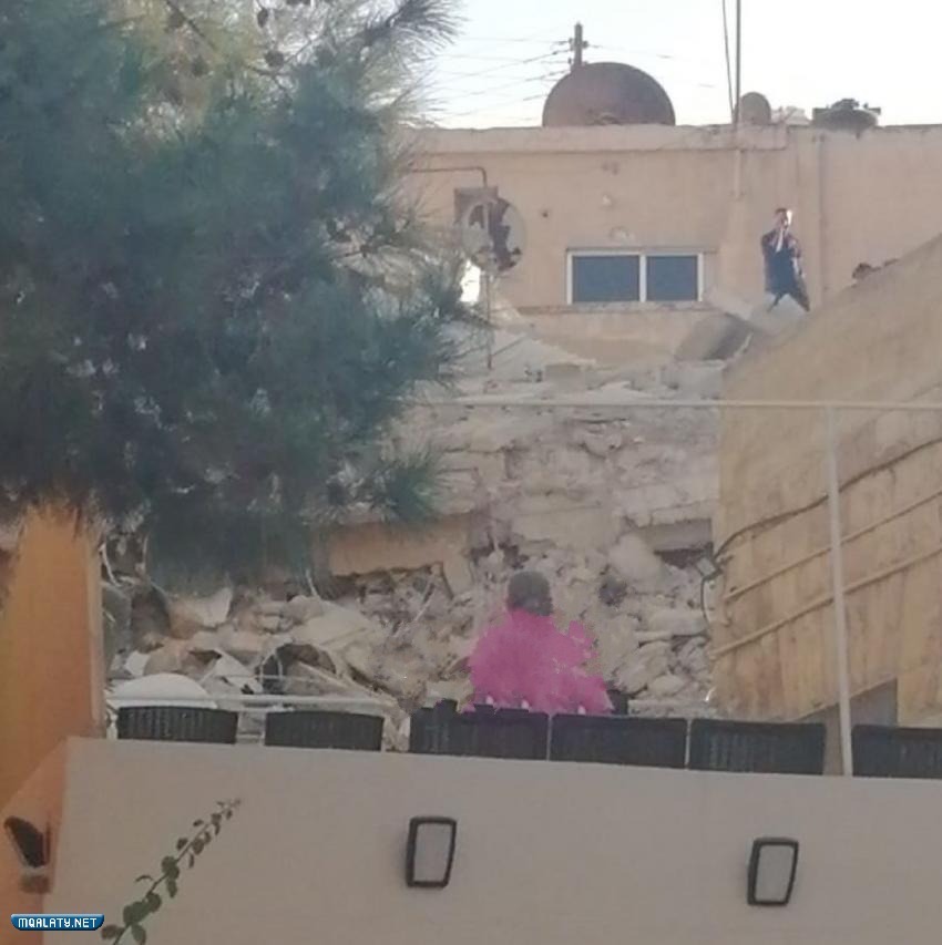 صور انهيار بناية في عمان اللويبدة